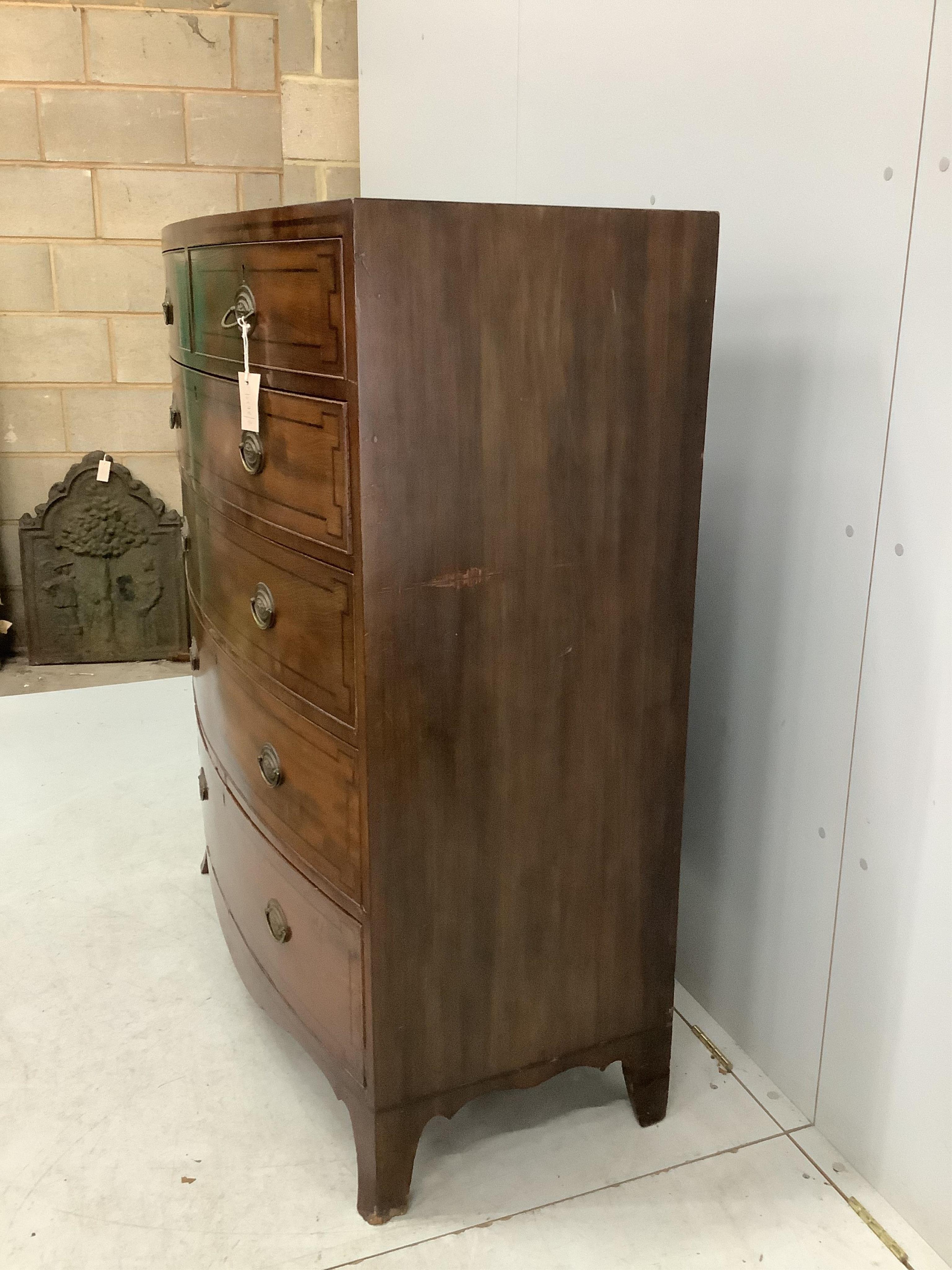 A Regency inlaid mahogany and ebony strung bowfront chest of six drawers, width 106cm, depth 52cm, height 128cm. Condition - fair